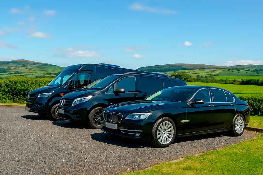 Private tour vehicles in Ireland including luxury sedan, minivan, and minibus by Unique Tours Ireland